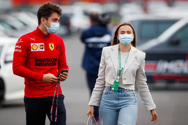 LECLERC Charles (mco), Scuderia Ferrari SF21, with his girlfriend SINE Charlotte during the Formula 1 Pirelli Gran Premio Del Made In Italy E Dell Emilia Romagna 2021 from April 16 to 18, 2021 on the Autodromo Internazionale Enzo e Dino Ferrari, in Imola, Italy - FORMULE 1 : Grand prix Emilie Romagne - Imola - Essais - 17 04 2021 DPPI Panoramic 
