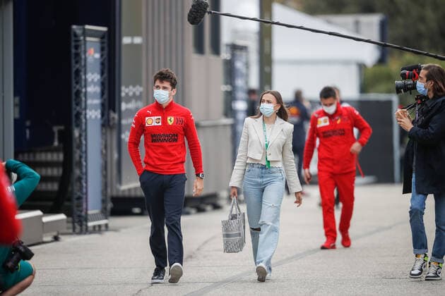 LECLERC Charles (mco), Scuderia Ferrari SF21, and his girlfriend SINE Charlotte, portrait during the Formula 1 Pirelli Gran Premio Del Made In Italy E Dell emilia Romagna 2021 from April 16 to 18, 2021 on the Autodromo Internazionale Enzo e Dino Ferrari, in Imola, Italy - FORMULE 1 : Grand prix Emilie Romagne - Imola - Essais - 17 04 2021 DPPI Panoramic 