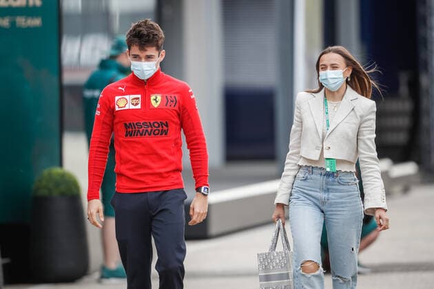 LECLERC Charles (mco), Scuderia Ferrari SF21, and his girlfriend SINE Charlotte, portrait during the Formula 1 Pirelli Gran Premio Del Made In Italy E Dell emilia Romagna 2021 from April 16 to 18, 2021 on the Autodromo Internazionale Enzo e Dino Ferrari, in Imola, Italy - FORMULE 1 : Grand prix Emilie Romagne - Imola - Essais - 17 04 2021 DPPI Panoramic 