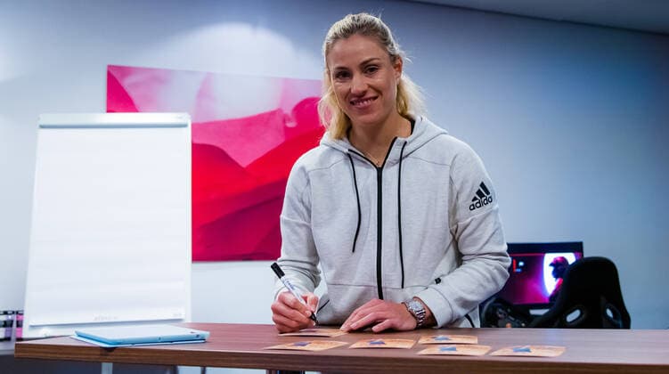 April 17, 2021, STUTTGART, GERMANY: Angelique Kerber of Germany signs autographs at the 2021 Porsche Tennis Grand Prix WTA, Tennis Damen 500 tournament STUTTGART GERMANY - ZUMAa181 20210417_zaa_a181_066 Copyright: xRobxPrangex
