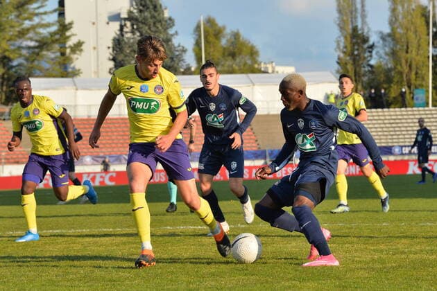 Asley Moke Ndedi (rumilly) vs Anthony Rouault (toulouse) FOOTBALL : GFA Rumilly Vallieres vs Toulouse FC - 1 4 de finale de Coupe de France - 20 04 2021 FredericChambert Panoramic 