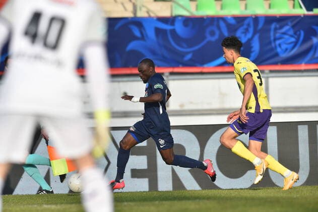 Glody Liongo Aduma (rumilly) vs Tom Rapnouil (toulouse) FOOTBALL : GFA Rumilly Vallieres vs Toulouse FC - 1 4 de finale de Coupe de France - 20 04 2021 FredericChambert Panoramic 