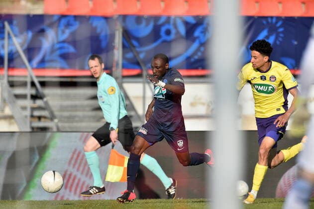 Glody Liongo Aduma (rumilly) vs Tom Rapnouil (toulouse) FOOTBALL : GFA Rumilly Vallieres vs Toulouse FC - 1 4 de finale de Coupe de France - 20 04 2021 FredericChambert Panoramic 