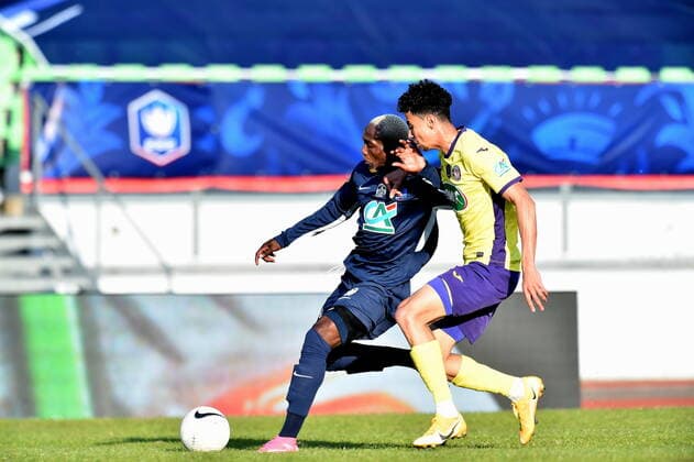 Asley Moke Ndedi (rumilly) vs Tom Rapnouil (toulouse) FOOTBALL : GFA Rumilly Vallieres vs Toulouse FC - 1 4 de finale de Coupe de France - 20 04 2021 FredericChambert Panoramic 
