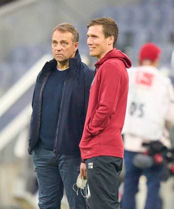 Fussball 1.German Soccer League FC BAYERN MUENCHEN - BAYER 04 LEVERKUSEN Trainer Hansi, Hans-Dieter FLICK (FCB), team manager, headcoach, coach, Hannes WOLF, headcoach teammanager Leverkusen in the match FC BAYERN MUENCHEN - BAYER 04 LEVERKUSEN 1.German Football League on March 20, 2021 in Munich, Germany Season 2020 2021, matchday 30, 1.Bundesliga, FCB, München, 30.Spieltag Photographer: Peter Schatz Pool National and international News-Agencies OUT Editorial Use ONLY - DFL REGULATIONS PROHIBIT ANY USE OF PHOTOGRAPHS as IMAGE SEQUENCES and or QUASI-VIDEO - Munich Allianz Arena Bavaria Germany
