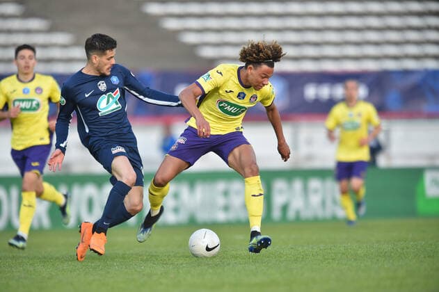 Jean Manuel Ribeiro (rumilly) vs Janis Antiste (toulouse) FOOTBALL : GFA Rumilly Vallieres vs Toulouse FC - 1 4 de finale de Coupe de France - 20 04 2021 FredericChambert Panoramic 
