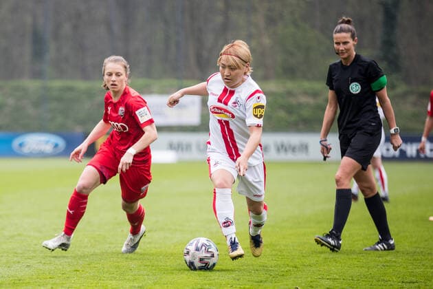 2. Frauen Fussball Bundesliga, 1. FC Koeln - FC Ingolstadt; 21.04.2021 Stefanie Reischmann ( 21, FC Ingolstadt), Yuka Hirano ( 17, 1. FC Koeln) 2. Frauen Fussball Bundesliga, 1. FC Koeln - FC Ingolstadt, Koeln, Geissbockheim DFL REGULATIONS PROHIBIT ANY USE OF PHOTOGRAPHS AS IMAGE SEQUENCES AND OR QUASI-VIDEO. Copyright: xBEAUTIFULxSPORTS Wunderlx