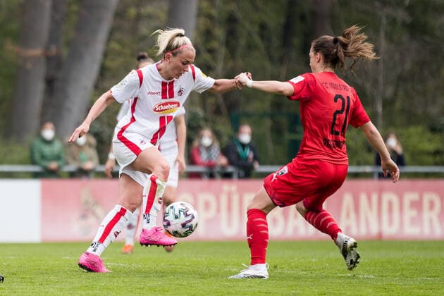 2. Frauen Fussball Bundesliga, 1. FC Koeln - FC Ingolstadt; 21.04.2021 Mandy Islacker ( 8, 1. FC Koeln), Stefanie Reischmann ( 21, FC Ingolstadt) 2. Frauen Fussball Bundesliga, 1. FC Koeln - FC Ingolstadt, Koeln, Geissbockheim DFL REGULATIONS PROHIBIT ANY USE OF PHOTOGRAPHS AS IMAGE SEQUENCES AND OR QUASI-VIDEO. Copyright: xBEAUTIFULxSPORTS Wunderlx