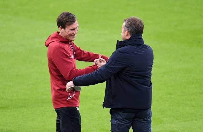 Fussball 1. Bundesliga Saison 20 21: FC Bayern Muenchen - Bayer 04 Leverkusen Fussball 1. Bundesliga Saison 2020 2021 30. Spieltag FC Bayern Muenchen - Bayer 04 Leverkusen 20.04.2021 Trainer Hansi Flick (re, FC Bayern Muenchen) begruesst Trainer Hannes Wolf (li, Bayer 04 Leverkusen) vor dem Spiel FOTO: Markus Ulmer Pressefoto Ulmer Pool xxNOxMODELxRELEASExx DFL regulations prohibit any use of photographs as image sequences and or quasi-video. Muenchen Deutschland