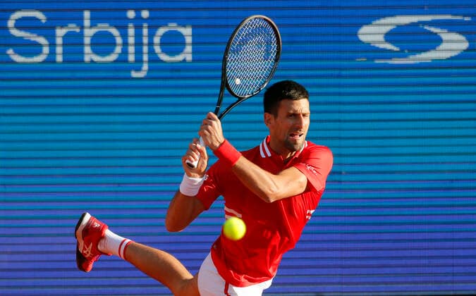 (210425) -- BELGRADE, April 25, 2021 -- Serbia s Novak Djokovic returns a shot during the ATP, Tennis Herren 250 Serbia Open singles semifinal tennis match between Serbia s Novak Djokovic and Russia s Aslan Karatsev in Belgrade, Serbia on April 24, 2021. (Photo by Xinhua) (SP)SERBIA-BELGRADE-TENNIS-ATP SERBIA OPEN-SEMIFINAL PredragxMilosavljevic 