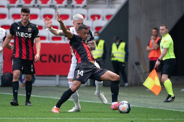 Dan Ndoye (OGC Nice) - Mihailo Ristic (Montpellier FC) FOOTBALL : OGC Nice vs Montpellier - Ligue 1 Uber Eats - Nice - 25 04 2021 NorbertScanella PanoramiC 