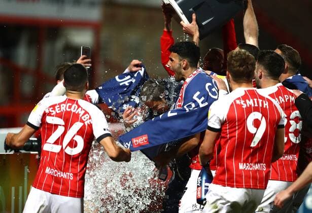 Mandatory Credit: Photo by Kieran McManus BPI Shutterstock (11877712ad) Cheltenham Town manager Michael Duff has an ice bucket thrown over him by his players as he is interviewed Cheltenham Town v Carlisle United, EFL Sky Bet League Two, Football, The Jonny-Rocks Stadium, Cheltenham, UK - 27 Apr 2021 EDITORIAL USE ONLY No use with unauthorised audio, video, data, fixture lists, club league logos or live services. Online in-match use limited to 120 images, no video emulation. No use in betting, games or single club league player publications. Cheltenham Town v Carlisle United, EFL Sky Bet League Two, Football, The Jonny-Rocks Stadium, Cheltenham, UK - 27 Apr 2021 EDITORIAL USE ONLY No use with unauthorised audio, video, data, fixture lists, club league logos or live services. Online in-match use limited to 120 images, no video emulation. No use in betting, games or single club league player publications. Copyright: xKieranxMcManus BPI Shutterstockx 11877712ad
