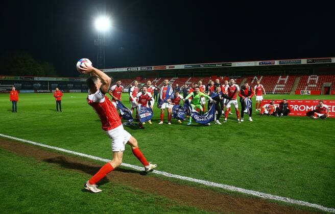 Mandatory Credit: Photo by Kieran McManus BPI Shutterstock (11877712aq) Cheltenham Town players celebrate winning promotion from League Two with a Ben Tozer of Cheltenham Town long throw Cheltenham Town v Carlisle United, EFL Sky Bet League Two, Football, The Jonny-Rocks Stadium, Cheltenham, UK - 27 Apr 2021 EDITORIAL USE ONLY No use with unauthorised audio, video, data, fixture lists, club league logos or live services. Online in-match use limited to 120 images, no video emulation. No use in betting, games or single club league player publications. Cheltenham Town v Carlisle United, EFL Sky Bet League Two, Football, The Jonny-Rocks Stadium, Cheltenham, UK - 27 Apr 2021 EDITORIAL USE ONLY No use with unauthorised audio, video, data, fixture lists, club league logos or live services. Online in-match use limited to 120 images, no video emulation. No use in betting, games or single club league player publications. Copyright: xKieranxMcManus BPI Shutterstockx 11877712aq