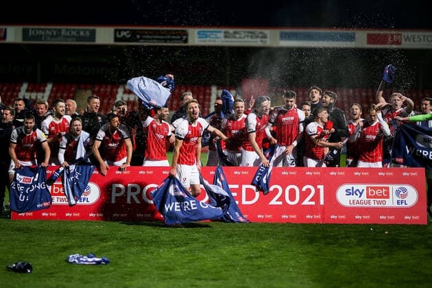Mandatory Credit: Photo by Robbie Stephenson JMP Shutterstock (11878432o) Cheltenham Town celebrate promotion out of Sky Bet League Two into Sky Bet League One Cheltenham Town v Carlisle United, UK - 27 Apr 2021 EDITORIAL USE ONLY No use with unauthorised audio, video, data, fixture lists (outside the EU), club league logos or live services. Online in-match use limited to 45 images (+15 in extra time). No use to emulate moving images. No use in betting, games or single club league player publications services. Cheltenham Town v Carlisle United, UK - 27 Apr 2021 EDITORIAL USE ONLY No use with unauthorised audio, video, data, fixture lists (outside the EU), club league logos or live services. Online in-match use limited to 45 images (+15 in extra time). No use to emulate moving images. No use in betting, games or Copyright: xRobbiexStephenson JMP Shutterstockx 11878432o