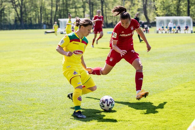 2. Frauen Fussball Bundesliga, 1. FC Koeln - FC Bayern Muenchen II; 28.04.2021 Alicia-Sophie Gudorf ( 12, 1. FC Koeln), Julia Pollak ( 24, FC Bayern Muenchen II) 2. Frauen Fussball Bundesliga, 1. FC Koeln - FC Bayern Muenchen II, Koeln, Geissbockheim DFL REGULATIONS PROHIBIT ANY USE OF PHOTOGRAPHS AS IMAGE SEQUENCES AND OR QUASI-VIDEO. Copyright: xBEAUTIFULxSPORTS Wunderlx