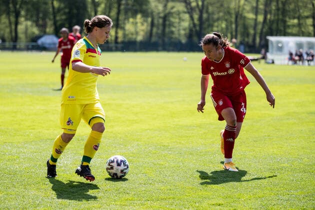 2. Frauen Fussball Bundesliga, 1. FC Koeln - FC Bayern Muenchen II; 28.04.2021 Alicia-Sophie Gudorf ( 12, 1. FC Koeln), Julia Pollak ( 24, FC Bayern Muenchen II) 2. Frauen Fussball Bundesliga, 1. FC Koeln - FC Bayern Muenchen II, Koeln, Geissbockheim DFL REGULATIONS PROHIBIT ANY USE OF PHOTOGRAPHS AS IMAGE SEQUENCES AND OR QUASI-VIDEO. Copyright: xBEAUTIFULxSPORTS Wunderlx