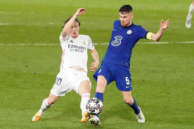 Real Madrid s Luka Modric (l) and Chelsea FC s Jorginho during UEFA Champions League Semi-finals 1st leg match. April 27,2021. (20210427647)