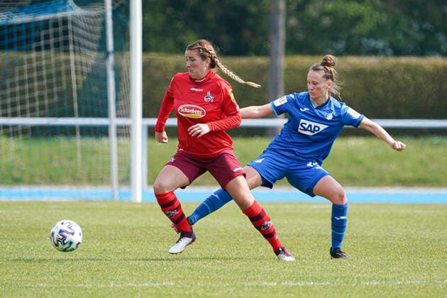 v.li.: Rachel Rinast (Köln, 31), Sophie Riepl (TSG II, 33), Zweikampf, Spielszene, Duell, duel, tackle, tackling, Dynamik, Action, Aktion, 02.05.2021, Sinsheim (Deutschland), Fussball, 2. Frauen-Bundesliga Süd, TSG 1899 Hoffenheim II (U20) - 1. FC Köln, DFB DFL REGULATIONS PROHIBIT ANY USE OF PHOTOGRAPHS AS IMAGE SEQUENCES AND OR QUASI-VIDEO.