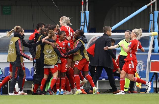 Kington Upon Thames, England, 2nd May 2021. Sarah Zadrazil of Bayern Munich runs to the bench to celebrate her stunning goal during the UEFA Women s Champions League match at Kingsmeadow, Kington Upon Thames. Picture credit should read: Paul Terry Sportimage EDITORIAL USE ONLY. No use with unauthorised audio, video, data, fixture lists, club league logos or live services. Online in-match use limited to 120 images, no video emulation. No use in betting, games or single club league player publications. SPI-1031-0030