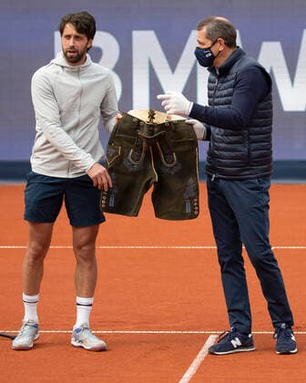 Veranstalter Michael Mronz ueberreicht demSieger Nikoloz Basilashvili (GEO) mit eine bayerische Lederhose, Herren Einzel, Siegerehrung, Praesentation Tennis - BMW Open 2021 - ATP, Tennis Herren - MTTC Iphitos - Munich - - Germany - 2 May 2021. Copyright: xJuergenxHasenkopfx