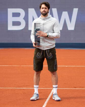 Sieger Nikoloz Basilashvili (GEO) haelt den Pokal, Trophäe und traegt eine bayerische Lederhose, Herren Einzel, rSiegerehrung, Praesentation Tennis - BMW Open 2021 - ATP, Tennis Herren - MTTC Iphitos - Munich - - Germany - 2 May 2021. Copyright: xJuergenxHasenkopfx
