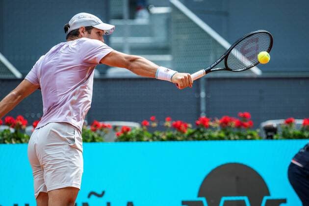 Dusan Lajovic of Serbia in action against Canadian Denis Shapovalov during their Mutua Madrid Open tennis tournament s game at Caja Magica tennis complex in Madrid, Spain, 02 May 2021. Mutua Madrid Open !ACHTUNG: NUR REDAKTIONELLE NUTZUNG!  Copyright: xRodrigoxJimenezx GRAF7675 20210502-637555729398827747