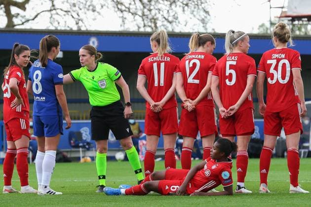 London, England, May 2nd 2021: Official Esther Staubli (SUI) warning to Melanie Leupolz ( 8 Chelsea) during the UEFA Womens Champions League Semi Final game between Chelsea and Bayern Munich at Kingsmeadow in London, England. UEFA Womens Champions League Semi Final - Chelsea v Bayern Munic 