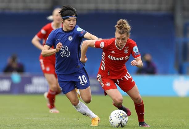 Kington Upon Thames, England, 2nd May 2021. Ji So-yun of Chelsea and Linda Dallmann of Bayern Munich challenge for the ball during the UEFA Women s Champions League match at Kingsmeadow, Kington Upon Thames. Picture credit should read: Paul Terry Sportimage EDITORIAL USE ONLY. No use with unauthorised audio, video, data, fixture lists, club league logos or live services. Online in-match use limited to 120 images, no video emulation. No use in betting, games or single club league player publications. SPI-1031-0107