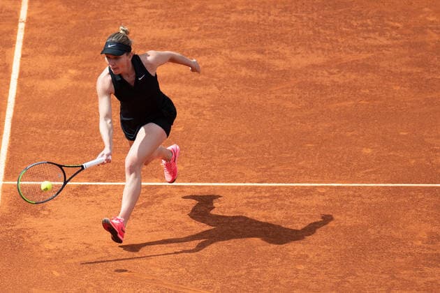 (210503) -- MADRID, May 3, 2021 -- Simona Halep of Romania returns the ball during the women s singles 2nd round match against Zheng Saisai of China at the Madrid Open tennis tournament in Madrid, Spain, May 2, 2021. ) (SP)SPAIN-MADRID-TENNIS-MADRID OPEN MengxDingbo 