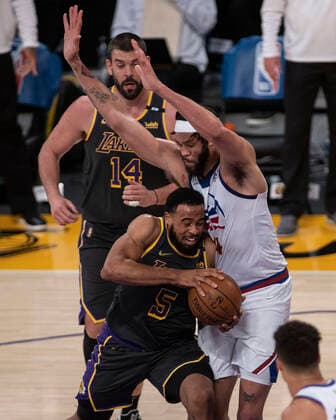 May 3, 2021, Los Angeles, California, USA: JaVale McGee 34 of the Denver Nuggets tries to block Talen Horton-Tucker 5 of the Los Angeles Lakers during their regular season NBA, Basketball Herren, USA game on Monday May 3, 2021 at the Staples Center in Los Angeles, California. Lakers defeat Nuggets, 93-89. PI Los Angeles USA - ZUMAp124 20210503_zaa_p124_035 Copyright: xJAVIERxROJASx