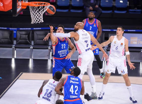Vasilije Micic (22) of Anadolu Efes and Alex Tyus of Real Madrid during the Turkish Airlines Euroleague quarter final 5th match between Anadolu Efes and Real Madrid at Sinan Erdem Dome in Istanbul , Turkey on May 04 , 2021. 