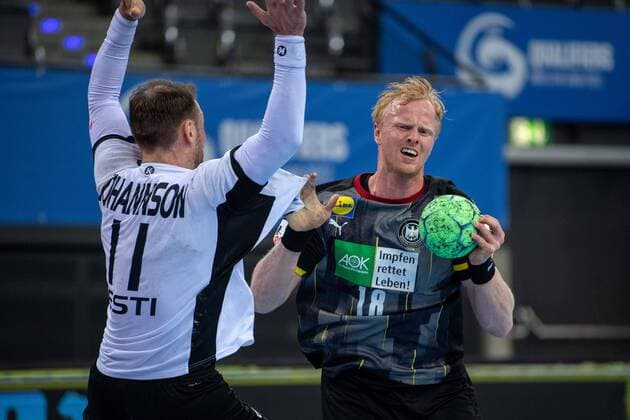 Handball Stuttgart 02.05.2021 Länderspiel DHB Männer Herren EHF Euro 2022 Qualifikation Qualification Deutschland (GER) - Estland (EST) Sebastian Firnhaber (Deutschland, No.18) Martin Johannson (Estland, No.11)