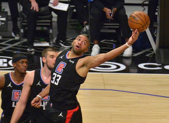 Los Angeles Clippers forward Nicolas Batum (33) reaches for the long rebound against the Los Angeles Lakers during the second half at Staples Center in Los Angeles on Thursday May 6, 2021. The Clippers defeated the Lakers 118-94.  LAP2021050612 JIMxRUYMEN