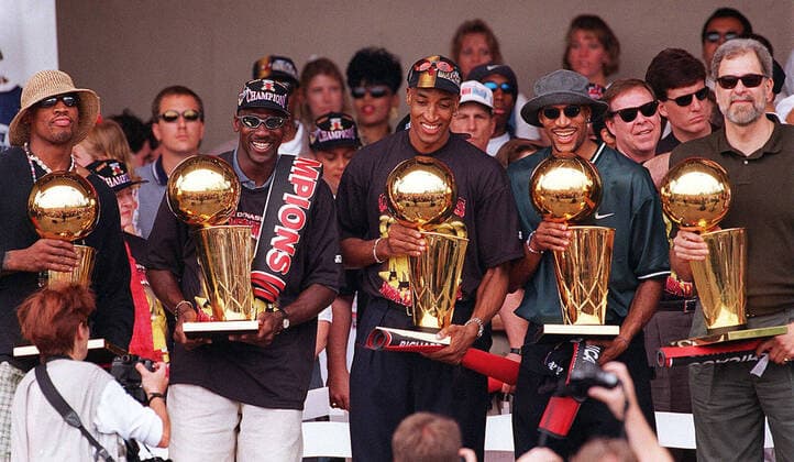 May 6, 2021: From left to right: Dennis Rodman, Michael Jordan, Scottie Pippen, Ron Harper and coach Phil Jackson hold the five championship trophies in 1997. - ZUMAm67_ 0117131731st Copyright: xCharlesxCherneyx