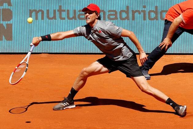 Dominic Thiem of Austria in action against John Isner of the USA during their Mutua Madrid Open men s quarter final match at the Caja Magica tennis premises in Madrid, central Spain, 07 Dominic Thiem vs. Jon Isner !ACHTUNG: NUR REDAKTIONELLE NUTZUNG!  Copyright: xCHEMAxMOYAx GRAF1411 20210507-637559935693064461