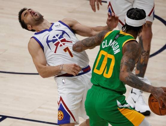 Denver Nuggets guard Facundo Campazzo (7) gets an elbow from Utah Jazz guard Jordan Clarkson (00) during an NBA, Basketball Herren, USA game at the Vivint Smart Home Arena in Salt Lake City, Utah, USA, 07 May 2021. Utah Jazz vs. Denver Nuggets !ACHTUNG: NUR REDAKTIONELLE NUTZUNG!  Copyright: xGEORGExFREYx AME6131 20210508-637560452230242046