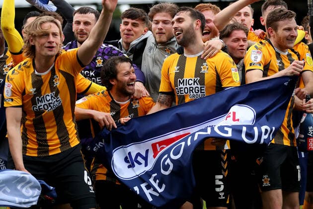 8th May 2021; Abbey Stadium, Cambridge, Cambridgeshire, England; English Football League Two Football, Cambridge United versus Grimsby Town; Cambridge Utd Manager players celebrate as they are promoted to EFL league 1  ActionPlus12286852 ShaunxBrooks