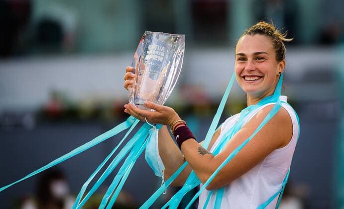 Mandatory Credit: Photo by Rob Prange Shutterstock (11888299ca) Aryna Sabalenka of Belarus with the champions trophy after winning the final of the 2021 Mutua Madrid Open WTA, Tennis Damen 1000 tournament Mutua Madrid Open, Tennis, La Caja Magica, Madrid, Spain - 08 May 2021 Mutua Madrid Open, Tennis, La Caja Magica, Madrid, Spain - 08 May 2021  Copyright: xRobxPrange Shutterstockx 11888299ca