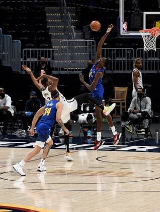 Denver Nuggets center Bol Bol 10(R) swats the ball and fouls Brooklyn Nets forward Kevin Durant 7 (C), while Denver Nuggets center JaVale McGee 34 (R), looks on during the first quarter at the Ball Arena in Denver, CO, USA, 08 May 2021. Denver Nuggets - Brooklyn Nets !ACHTUNG: NUR REDAKTIONELLE NUTZUNG!  Copyright: xToddxPiersonx AME6317 20210509-637561343768757853