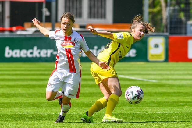 v.li.: Alicia-Sophie Gudorf (Köln, 12), Nicole Kreußer (Würzburger Kickers, 20), Zweikampf, Duell, duel, tackle, tackling, Dynamik, Action, Aktion, 09.05.2021, Köln (Deutschland), Fussball, 2. Frauen-Bundesliga Süd, 1. FC Köln - FC Würzburger Kickers, DFB DFL REGULATIONS PROHIBIT ANY USE OF PHOTOGRAPHS AS IMAGE SEQUENCES AND OR QUASI-VIDEO.