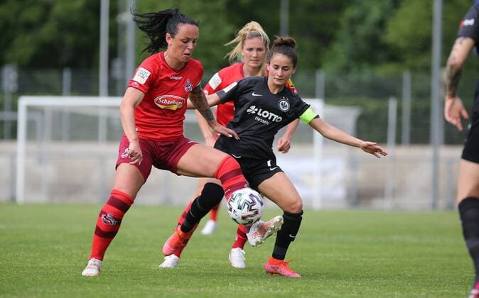 13.05.2021, xcex, GER, Frankfurt am Main, Stadion am Brentanobad, Frauenfussball, 2. Bundesliga Sued, Frauen-Bundesliga Saison 2020 2021, SGE, Eintracht Frankfurt Frauen II - 1. FC Koeln, Peggy Kuznik (Koeln) gegen Caroline Krawczyk (SGE) DFL regulations prohibit any use of photographs as image sequences and or quasi-video