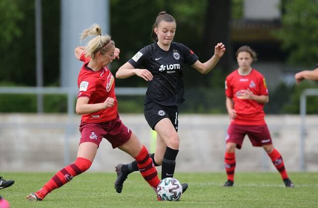 13.05.2021, xcex, GER, Frankfurt am Main, Stadion am Brentanobad, Frauenfussball, 2. Bundesliga Sued, Frauen-Bundesliga Saison 2020 2021, SGE, Eintracht Frankfurt Frauen II - 1. FC Koeln, Malin Janser (SGE) gegen Sharon Beck (Koeln) DFL regulations prohibit any use of photographs as image sequences and or quasi-video