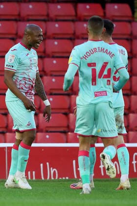 Football - 2020 2021 Sky Bet Championship - Play-offs - Semi-final 1st Leg - Barnsley vs Swansea City - Oakwell Andre Ayew of Swansea City celebrates scoring his side s first goal to make the score 0-1 