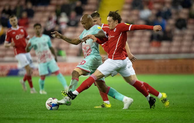 Barnsley v Swansea City Sky Bet Championship Callum Styles of Barnsley (right) and Andre Ayew of Swansea City challenge for the ball during the Sky Bet Championship Play-Off Semi Final 1st leg between Barnsley and Swansea City at Oakwell, Barnsley Content Not Available For UK Newspapers Copyright: xRussellxHartx FIL-15554-0032