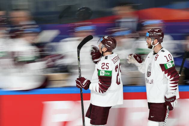 Eishockey, WM, Kanada - Lettland RIGA, LATVIA - MAY 21, 2021: Latviaâ€™s players celebrate a goal in their 2021 IIHF World Championship, WM, Weltmeisterschaft Group A Ice hockey, Eishockey match against Canada at Arena Riga. Natalia Fedosenko TASS  TS100E30