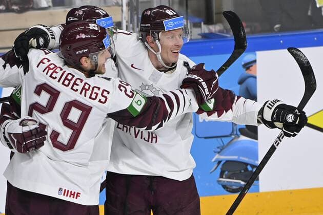 Eishockey, WM, Kanada - Lettland Ralfs Freibergs (l), Miks Indrasis and Ronalds Kenins of Latvia celebrates during the 2021 IIHF Ice hockey, Eishockey World Championships preliminary round group B match Canada vs Latvia in Riga, Latvia, on May 21, 2021. Riika, Riga Latvia LKFTJK20210521204752RCMC  Copyright: xJussixNukarix