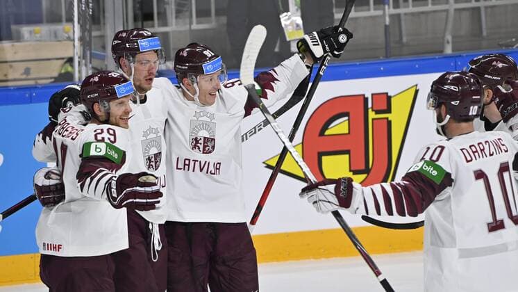 Eishockey, WM, Kanada - Lettland Ralfs Freibergs (l), Miks Indrasis, Ronalds Kenins and Lauris Darzins (r) of Latvia celebrates during the 2021 IIHF Ice hockey, Eishockey World Championships preliminary round group B match Canada vs Latvia in Riga, Latvia, on May 21, 2021. Riika, Riga Latvia LKFTJK20210521204724EBOD  Copyright: xJussixNukarix