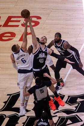 May 22, 2021, Los Angeles, California, USA: Ivica Zubac 40 of the Los Angeles Clippers and Kristaps Porzingis 6 of the Dallas Mavericks start Game One of the Western Conference First Round game against the Dallas Mavericks on Saturday May 22, 2021 at the Staples Center in Los Angeles, California. PI Los Angeles USA - ZUMAp124 20210522_zaa_p124_003 Copyright: xJAVIERxROJASx
