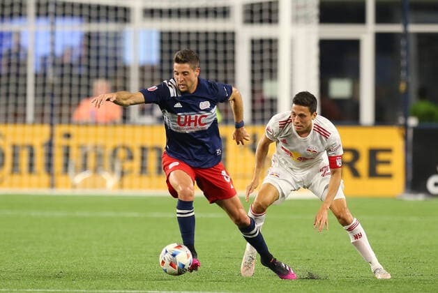 May 22, 2021; Foxborough, MA, USA; New England Revolution midfielder Matt Polster (8) and New York Red Bulls midfielder Sean Davis (27) in action during an MLS, Fussball Herren, USA match between New York Red Bulls Union and New England Revolution at Gillette Stadium. CSM Foxborough United States - ZUMAc04_ 20210522_zaf_c04_130 Copyright: xAnthonyxNesmithx