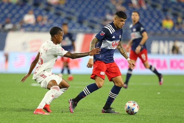 May 22, 2021; Foxborough, MA, USA; New England Revolution forward Gustavo Bou (7) and New York Red Bulls defender Kyle Duncan (6) in action during an MLS, Fussball Herren, USA match between New York Red Bulls Union and New England Revolution at Gillette Stadium. CSM Foxborough United States - ZUMAc04_ 20210522_zaf_c04_138 Copyright: xAnthonyxNesmithx
